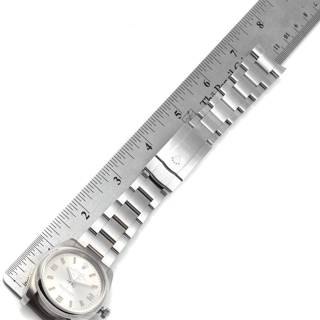 This image shows the front view of the Rolex 114200 Stainless Steel Silver Dial 114200 Stainless Steel Silver Dial Air King 114200 model, including the dial and part of the bracelet measured against a ruler.