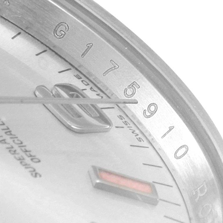 This image shows a close-up of the dial and minute markers of the Rolex 114200 Stainless Steel Silver Dial 114200 Stainless Steel Silver Dial Air King 114200 Silver Dial Pink Luminous Markers Unisex Watch.