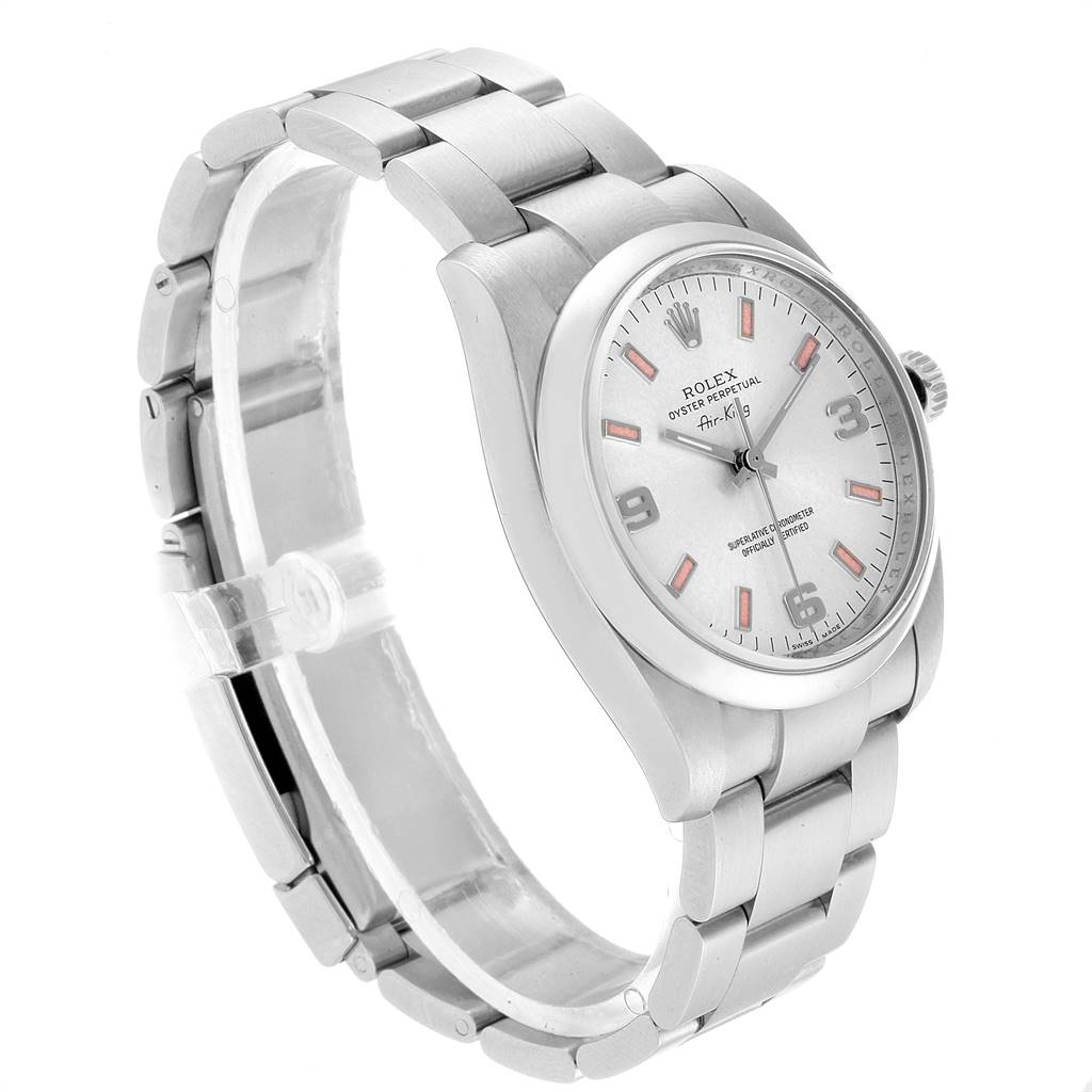 The Rolex 114200 Stainless Steel Silver Dial 114200 Stainless Steel Silver Dial Air King 114200 model in the image is shown from a three-quarter angle, displaying its dial, case, and bracelet.