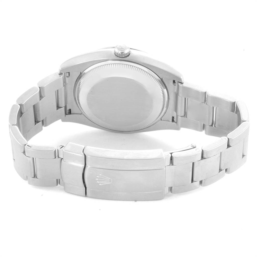 The image shows the back view of the Rolex 114200 Stainless Steel Silver Dial 114200 Stainless Steel Silver Dial Air King Silver Dial 114200 model, including the case back and bracelet with the clasp.