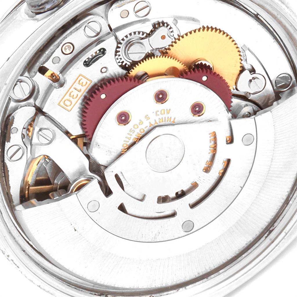 This image shows the internal movement mechanism of a Rolex Air-King 114200 Men's Stainless Steel White Dial 114200 Men's Stainless Steel White Dial watch viewed from the back.