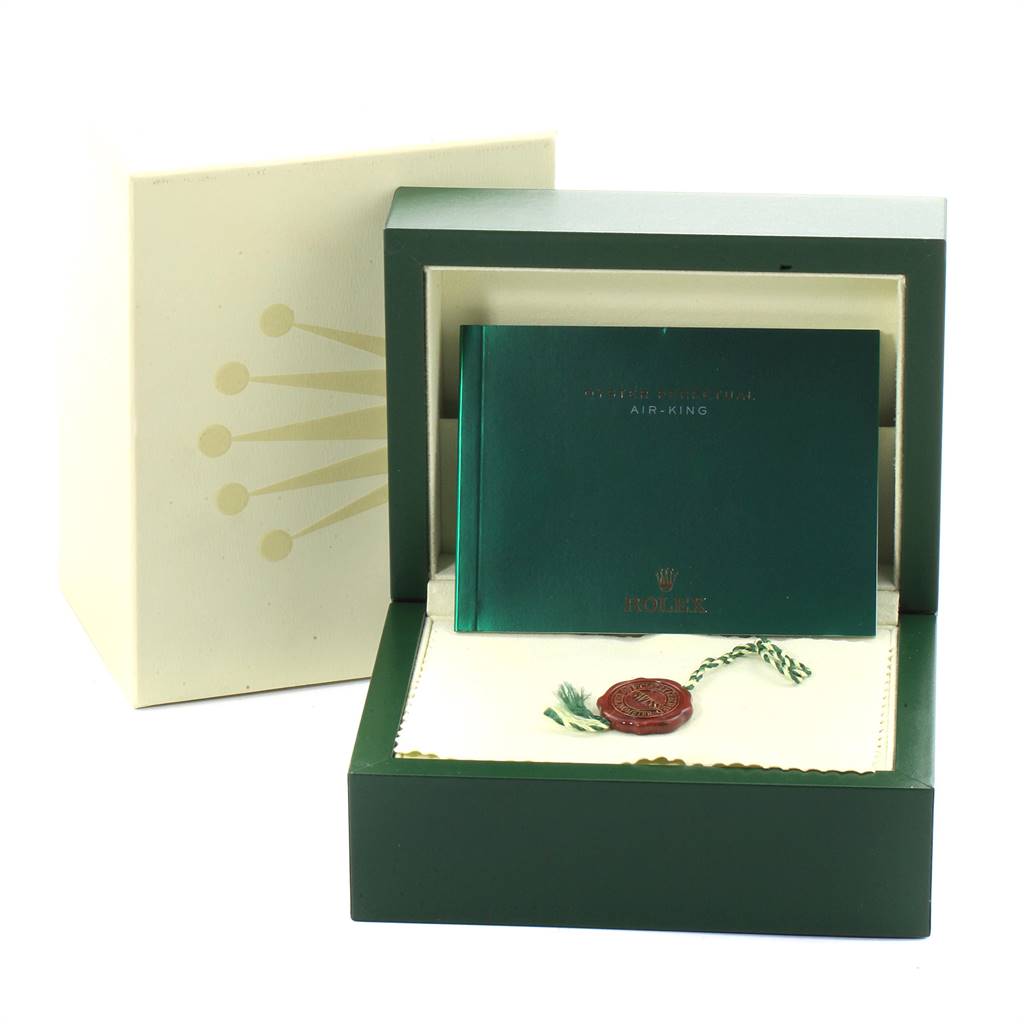 The image shows the packaging, a booklet, and an authenticity tag for a Rolex Air-King 114200 Men's Stainless Steel White Dial 114200 Men's Stainless Steel White Dial watch.