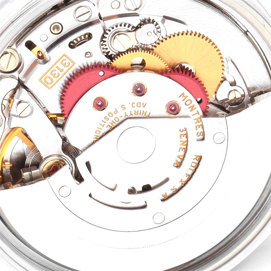 This close-up image shows the intricate internal parts of a Rolex Air-King 14000 Men's Stainless Steel Blue Dial 14000 Men's Stainless Steel Blue Dial watch movement.