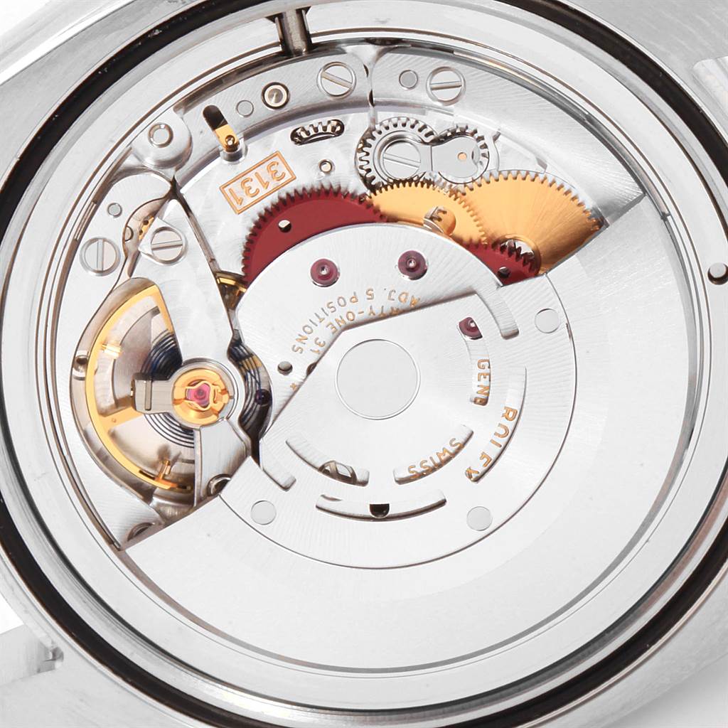 This image shows a close-up of the internal mechanism of a Rolex Air-King 116900 Men's Stainless Steel Black Dial 116900 Men's Stainless Steel Black Dial watch, focusing on its intricate movement components.