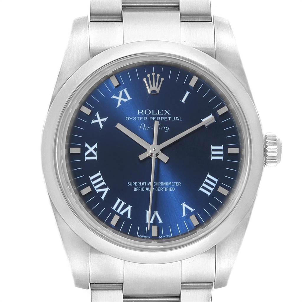 The image shows a close-up of a Rolex Air-King 114200 Men's Stainless Steel Blue Dial 114200 Men's Stainless Steel Blue Dial watch face and part of its stainless steel bracelet.