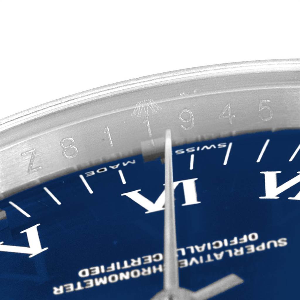 This image shows a close-up angle of the Rolex Air-King 114200 Men's Stainless Steel Blue Dial 114200 Men's Stainless Steel Blue Dial watch, focusing on the serial number and part of the dial.