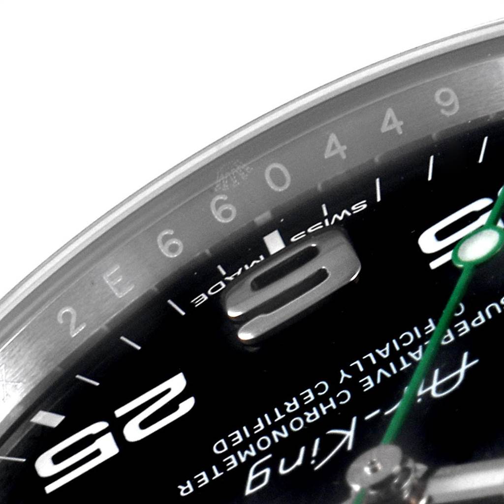 The image shows a close-up of the dial and hands of a Rolex Air-King 116900 Men's Stainless Steel Black Dial 116900 Men's Stainless Steel Black Dial watch, highlighting the 3 numeral, minute track, and branding text.