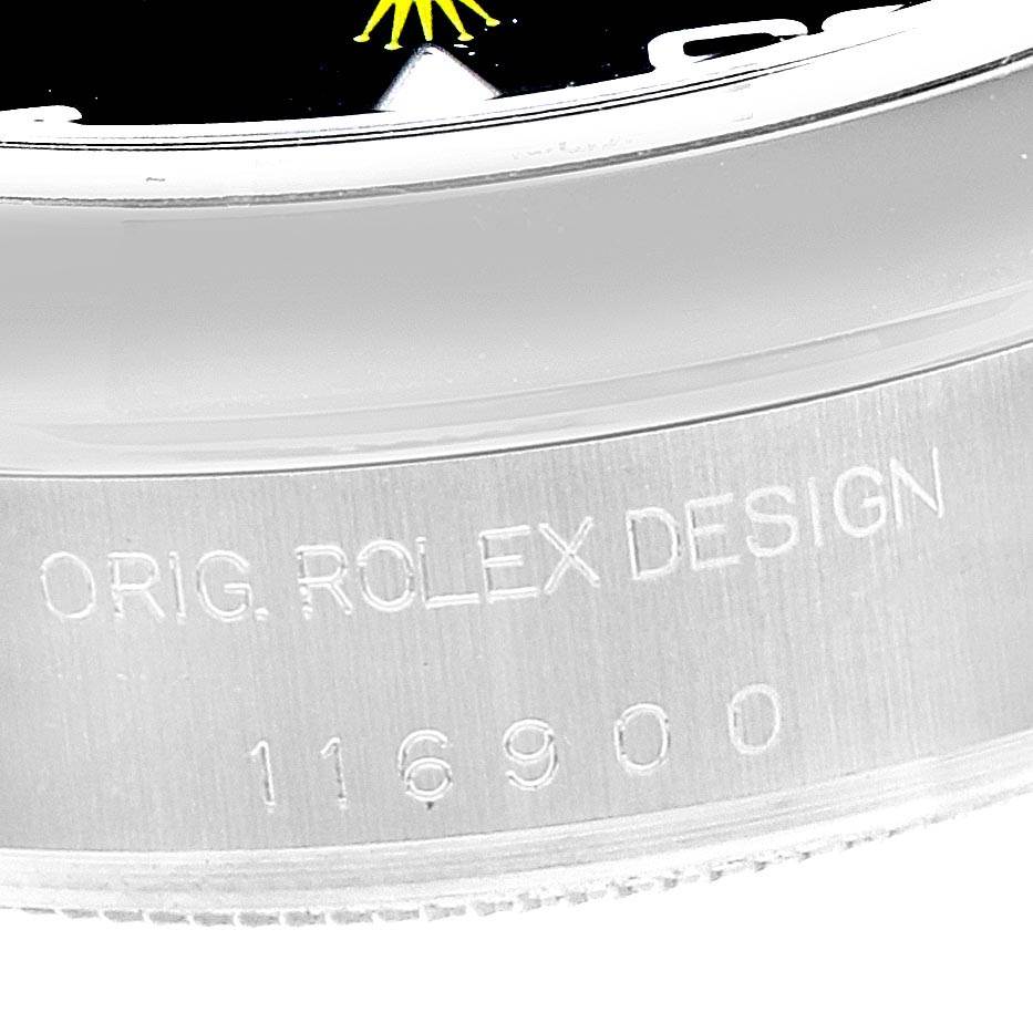 This image shows a close-up of the edge of the dial and the engraved case of a Rolex Air-King 116900 Men's Stainless Steel Black Dial 116900 Men's Stainless Steel Black Dial model, displaying "ORIG. ROLEX DESIGN" and model number 116900.