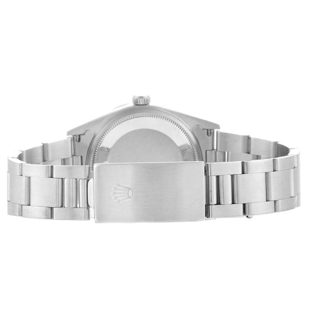 The image shows the rear view of a Rolex Air-King 14010 Men's Stainless Steel Silver Dial 14010 Men's Stainless Steel Silver Dial watch, highlighting the back case and bracelet with the clasp.