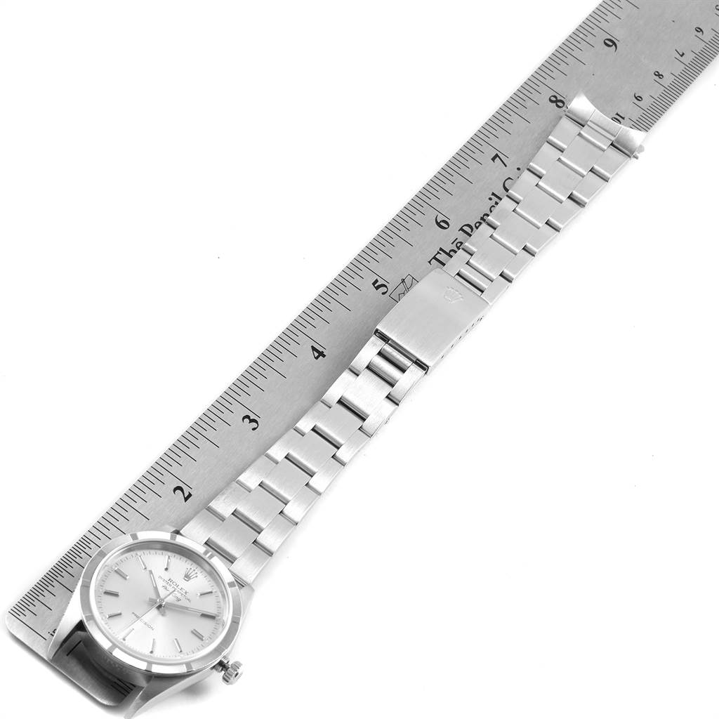 The image shows the dial and band of a Rolex Air-King 14010 Men's Stainless Steel Silver Dial 14010 Men's Stainless Steel Silver Dial watch, placed next to a ruler for scale.