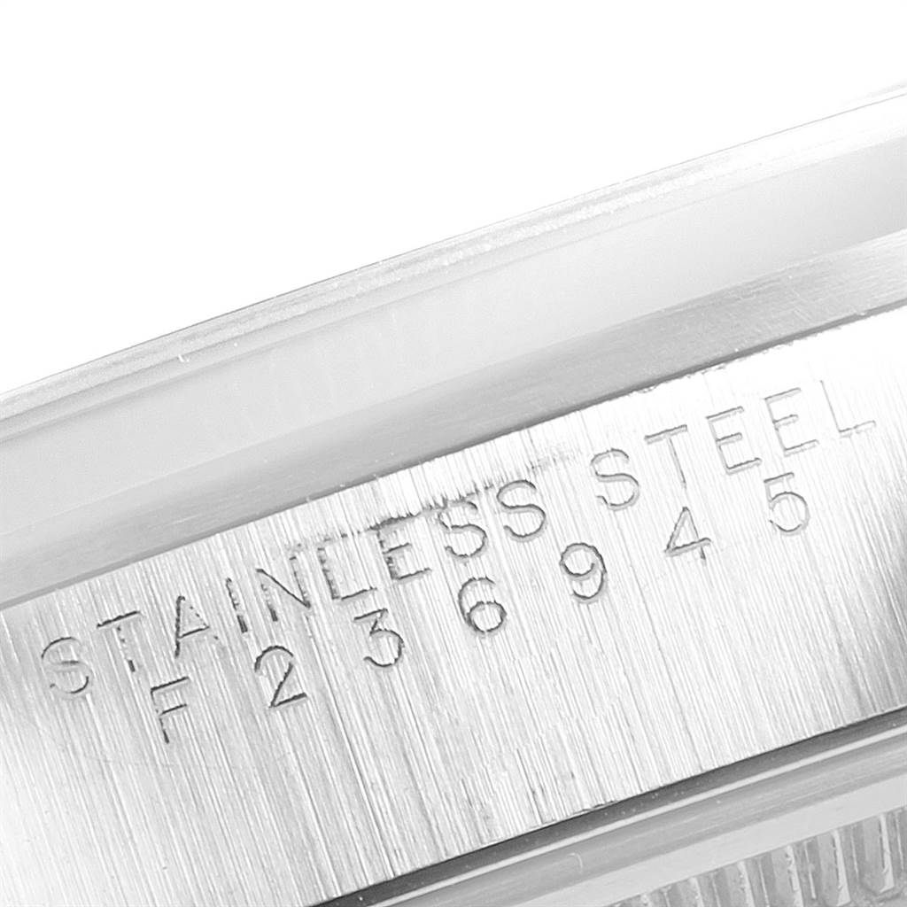 The image shows a close-up of the case side of the Rolex Air-King 14000 Men's Stainless Steel Black Dial 14000 Men's Stainless Steel Black Dial, highlighting the stainless steel and serial number engraving.