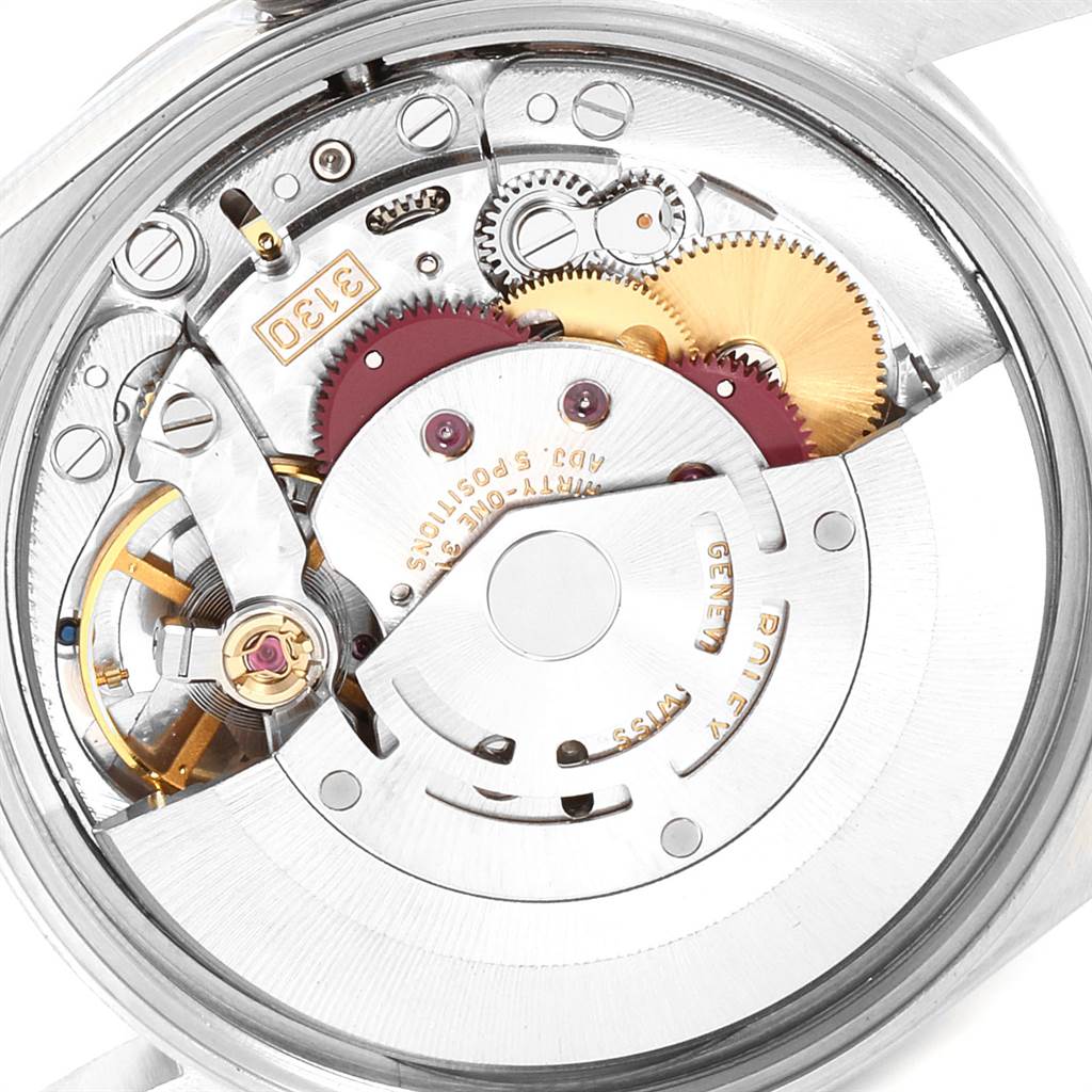 This is a close-up image of the inner mechanism of a Rolex Air-King 14000 Men's Stainless Steel Black Dial 14000 Men's Stainless Steel Black Dial watch, displaying its intricate gears and components.