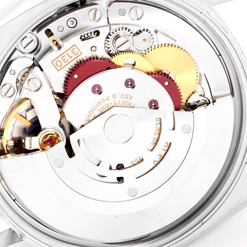 This image shows the internal mechanical movement of the Rolex Air-King 114200 Men's Stainless Steel Blue Dial 114200 Men's Stainless Steel Blue Dial watch, highlighting gears and intricate components.