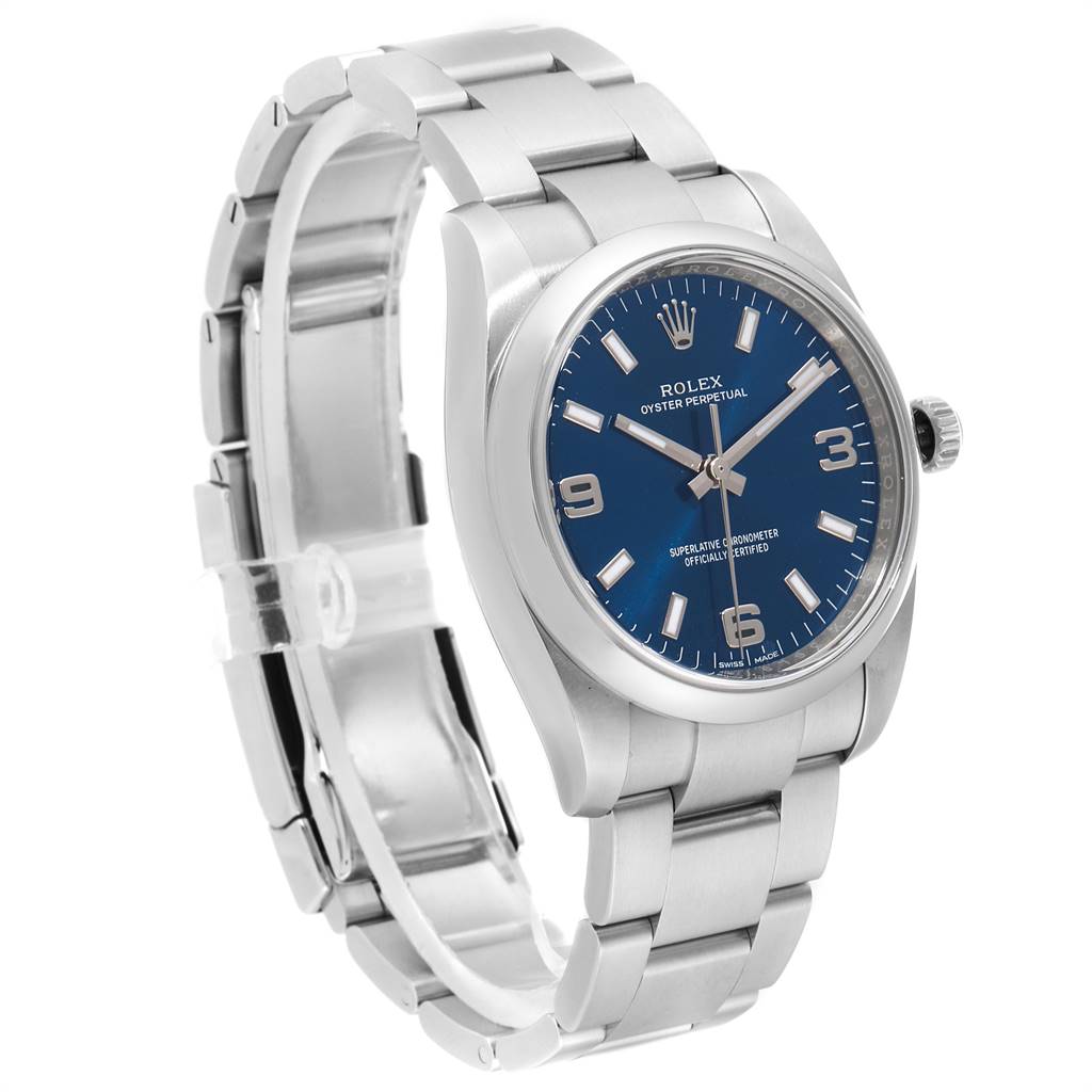 The image shows a Rolex Air-King 114200 Men's Stainless Steel Blue Dial 114200 Men's Stainless Steel Blue Dial watch at a 3/4 angle, displaying its dial, bezel, crown, and part of the bracelet.