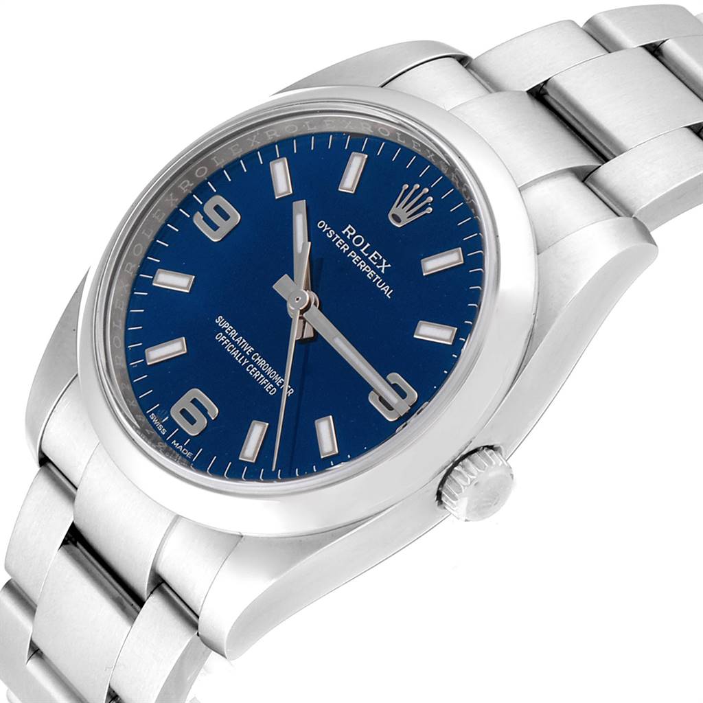 The image shows the face and part of the bracelet of a Rolex Air-King 114200 Men's Stainless Steel Blue Dial 114200 Men's Stainless Steel Blue Dial watch, angled slightly from the right side.