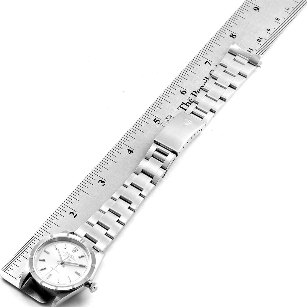 The image shows a Rolex Air-King 14010 Men's Stainless Steel Silver Dial 14010 Men's Stainless Steel Silver Dial watch laid flat next to a ruler, displaying the face, bracelet, and clasp.