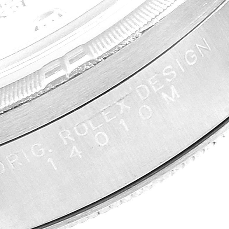 This image shows a close-up of the side of the bezel and the engraved case edge of the Rolex Air-King 14010 Men's Stainless Steel Silver Dial 14010 Men's Stainless Steel Silver Dial watch.