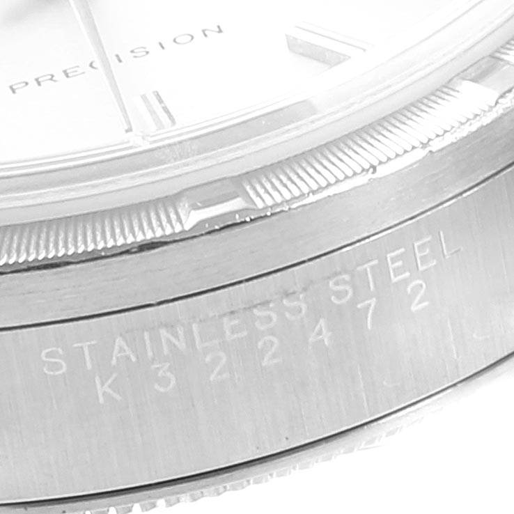 The image shows a close-up view of the case and bezel of the Rolex Air-King 14010 Men's Stainless Steel Silver Dial 14010 Men's Stainless Steel Silver Dial watch, displaying the "Stainless Steel" engraving.