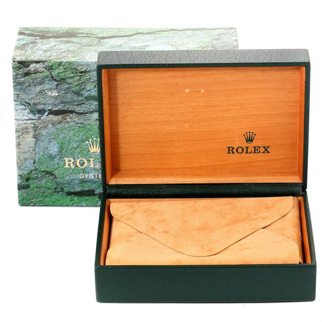 This image shows an open Rolex Air-King 14010 Men's Stainless Steel Silver Dial 14010 Men's Stainless Steel Silver Dial watch box with its inner lining and cover packaging.