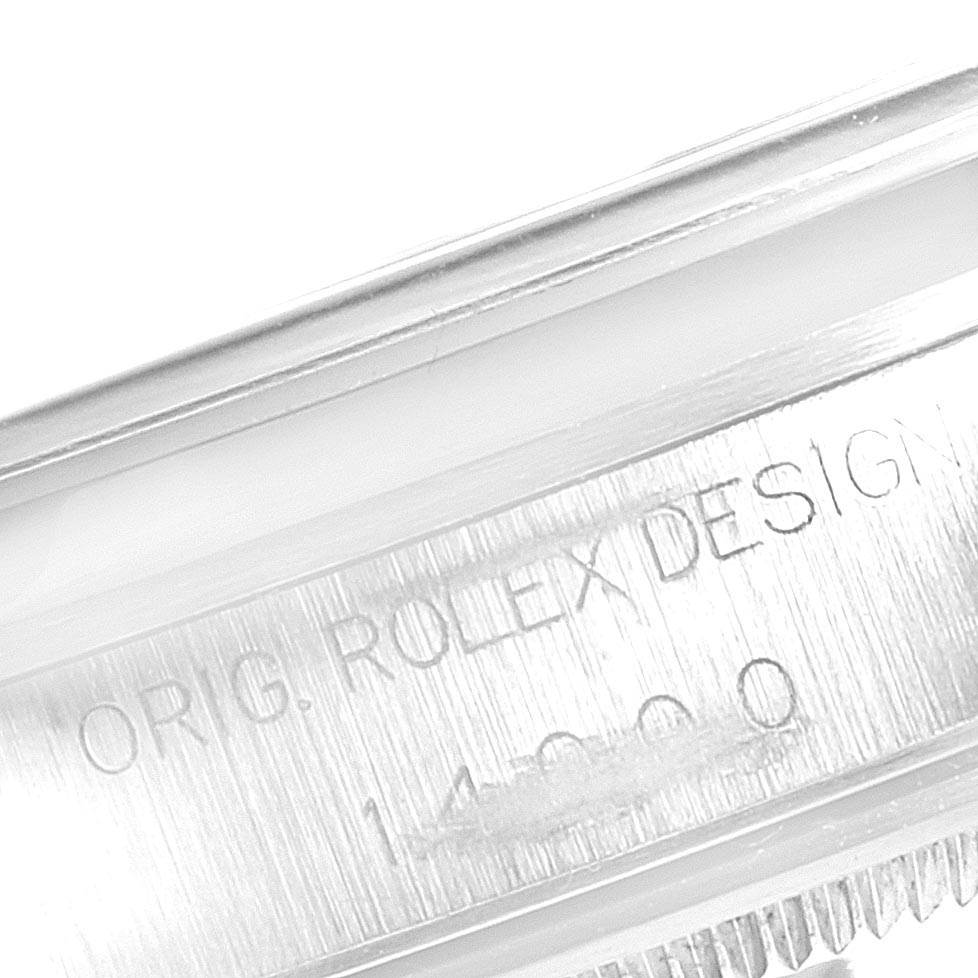 The image shows a close-up of the engraving on the case between the lugs of a Rolex Air-King 14000 Men's Stainless Steel Blue Dial 14000 Men's Stainless Steel Blue Dial watch.