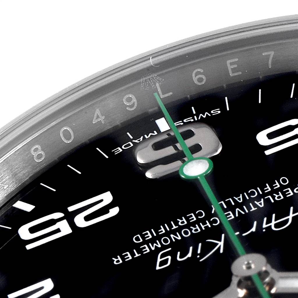 Close-up view of the Rolex Air-King 116900 Men's Stainless Steel Black Dial 116900 Men's Stainless Steel Black Dial watch face, showing the dial, numerals, and part of the minute hand.