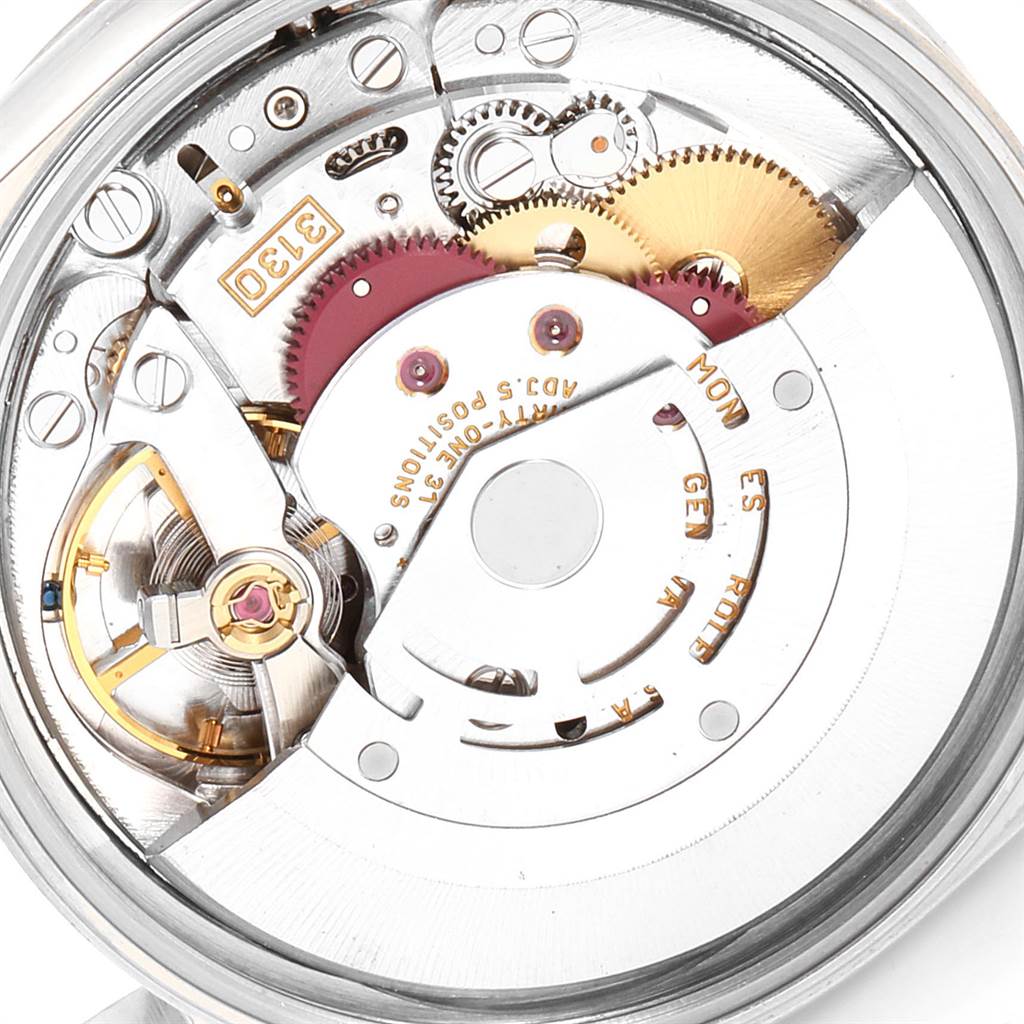 This is an internal view of the Rolex Air-King 14000 Men's Stainless Steel Blue Dial 14000 Men's Stainless Steel Blue Dial watch mechanism, showcasing gears and movement components.