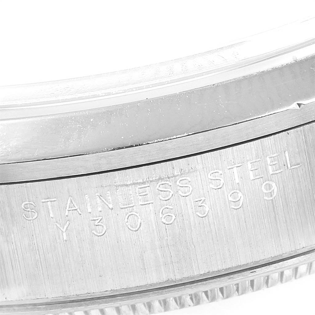 This image shows a close-up view of the stainless steel casing of a Rolex Air-King 14000 Men's Stainless Steel Blue Dial 14000 Men's Stainless Steel Blue Dial watch, revealing the serial number.