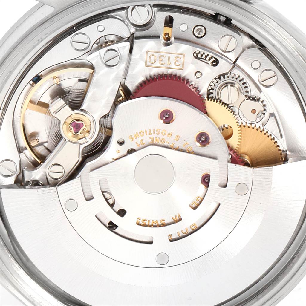 This image shows the internal mechanics and movement components of an Air-King watch by Rolex from a close-up angle.