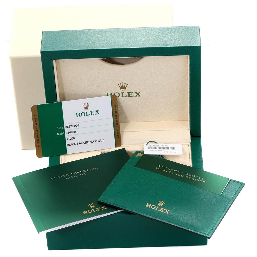 The image shows the packaging and documentation for a Rolex Air-King 116900 Men's Stainless Steel Black Dial 116900 Men's Stainless Steel Black Dial model, including warranty cards and booklets.