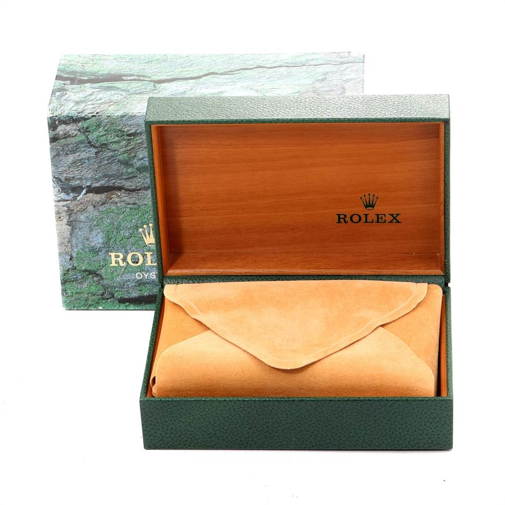 The image shows an open Rolex Air-King 14000 Men's Stainless Steel Pink Dial 14000 Men's Stainless Steel Pink Dial watch box with a green exterior, wooden interior, and a suede pouch inside, viewed from the front.