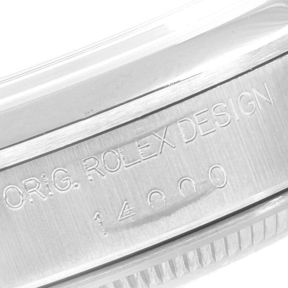 The image shows a close-up of the case side of a Rolex Air-King 14000 Men's Stainless Steel Pink Dial 14000 Men's Stainless Steel Pink Dial, highlighting the engravings.