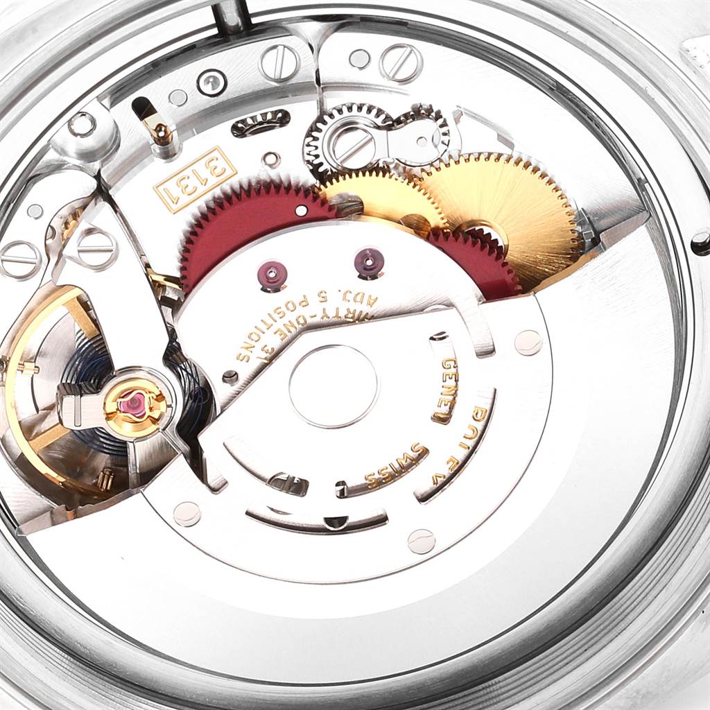 This image shows a close-up view of the intricate inner mechanisms of the Rolex Air-King 116900 Men's Stainless Steel Black Dial 116900 Men's Stainless Steel Black Dial watch.