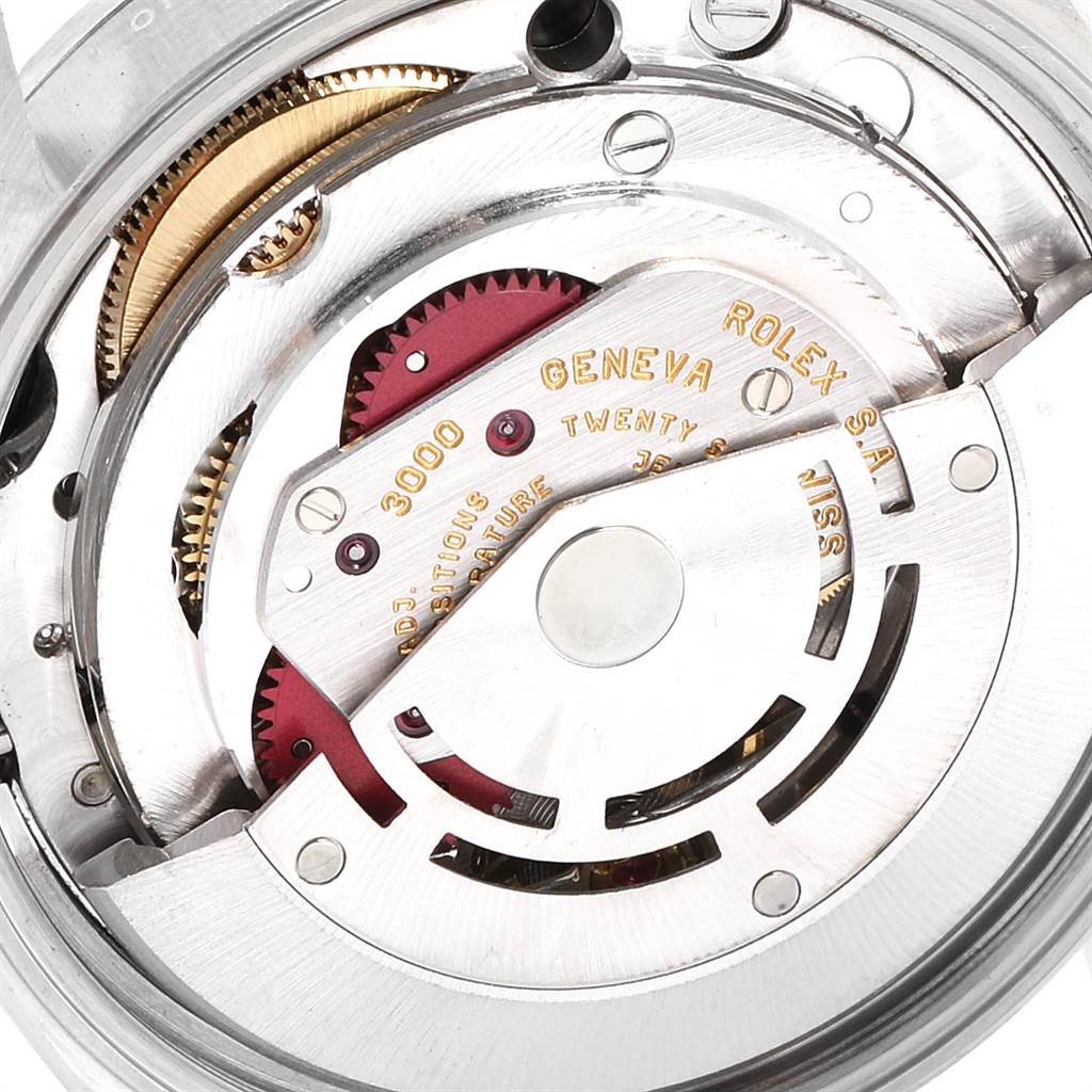 This image shows a close-up of the Rolex Air-King 14000 Men's Stainless Steel Black Dial 14000 Men's Stainless Steel Black Dial watch's internal mechanical movements from an aerial angle.