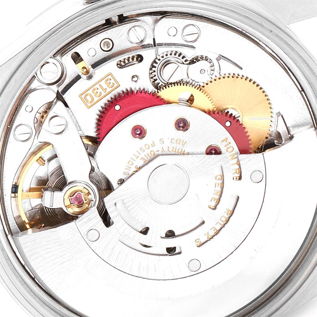 This is an internal view of the Rolex Air-King 14000 Men's Stainless Steel Silver Dial 14000 Men's Stainless Steel Silver Dial watch, showing its intricate mechanical movement components and gears.