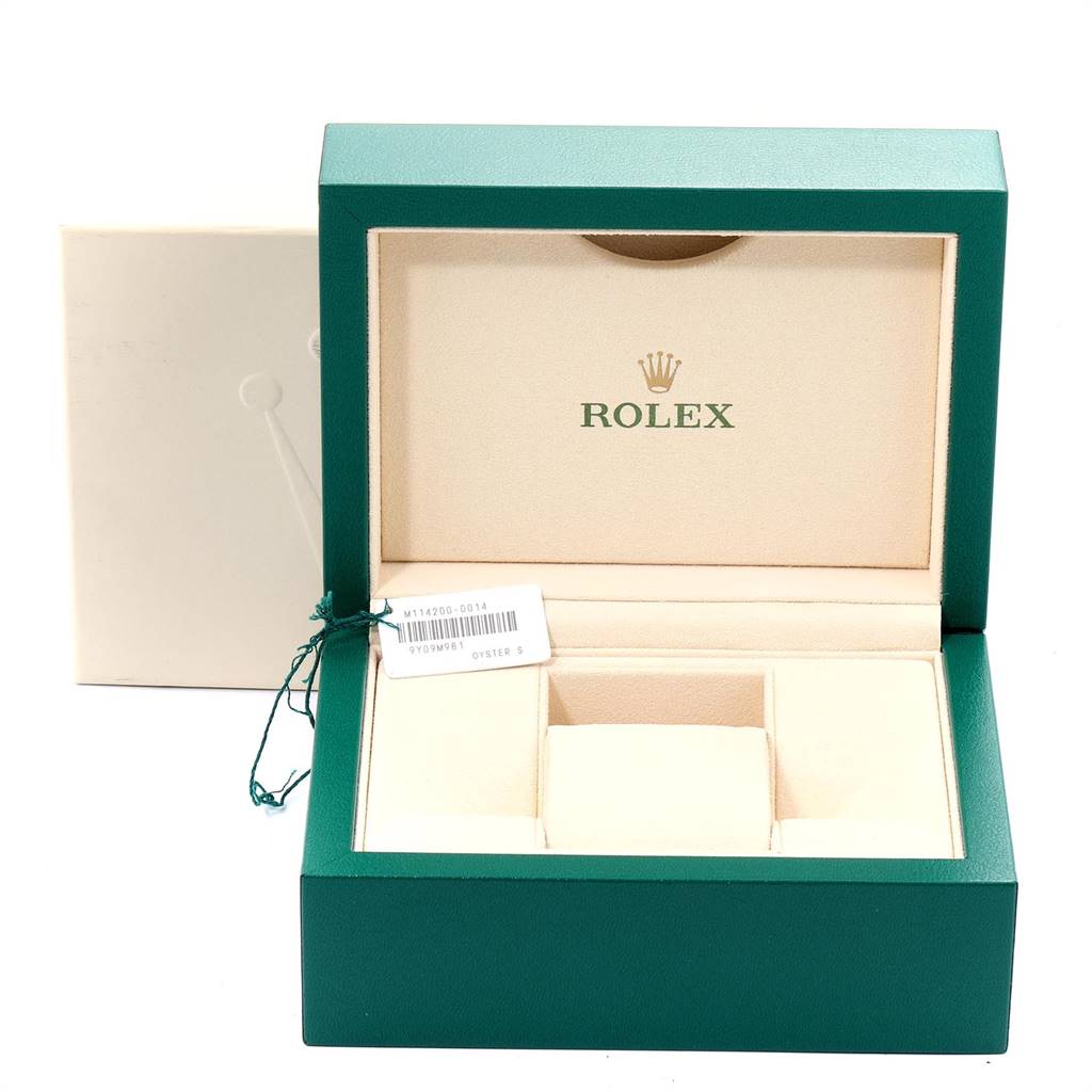 The image shows an open Rolex watch box for the Air-King model, viewed from the front with compartments and a tag visible.