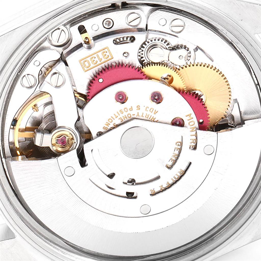 The image shows a close-up of the internal mechanism of a Rolex Air-King 14000 Men's Stainless Steel Black Dial 14000 Men's Stainless Steel Black Dial watch, highlighting its gears and intricate parts.