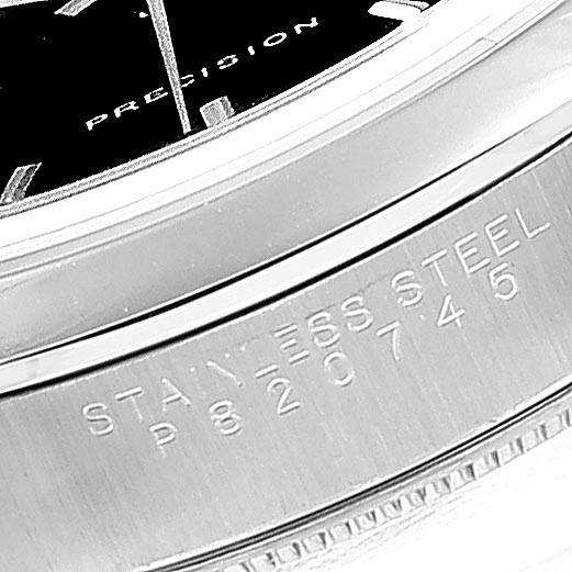 The image shows a close-up of the bezel and part of the dial of a Rolex Air-King 14000 Men's Stainless Steel Black Dial 14000 Men's Stainless Steel Black Dial, highlighting "PRECISION" and "STAINLESS STEEL."