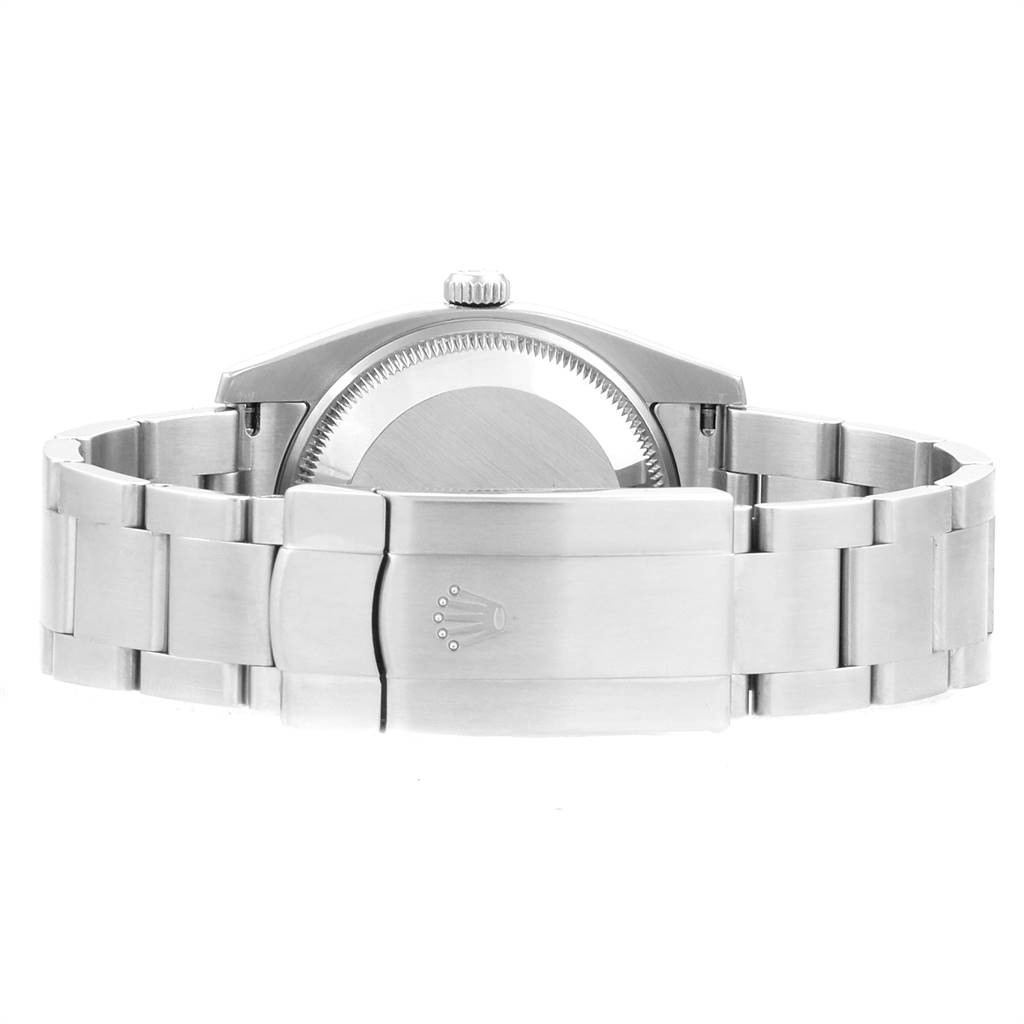 The Rolex Air-King 114200 Men's Stainless Steel White Dial 114200 Men's Stainless Steel White Dial watch is shown from the back, highlighting its stainless steel bracelet and case back.