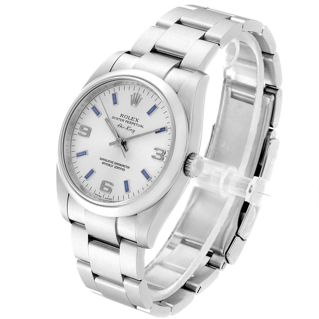 The image shows a Rolex Air-King 114200 Men's Stainless Steel Silver Dial 114200 Men's Stainless Steel Silver Dial watch at a three-quarter angle, highlighting the face, bezel, and metal band.