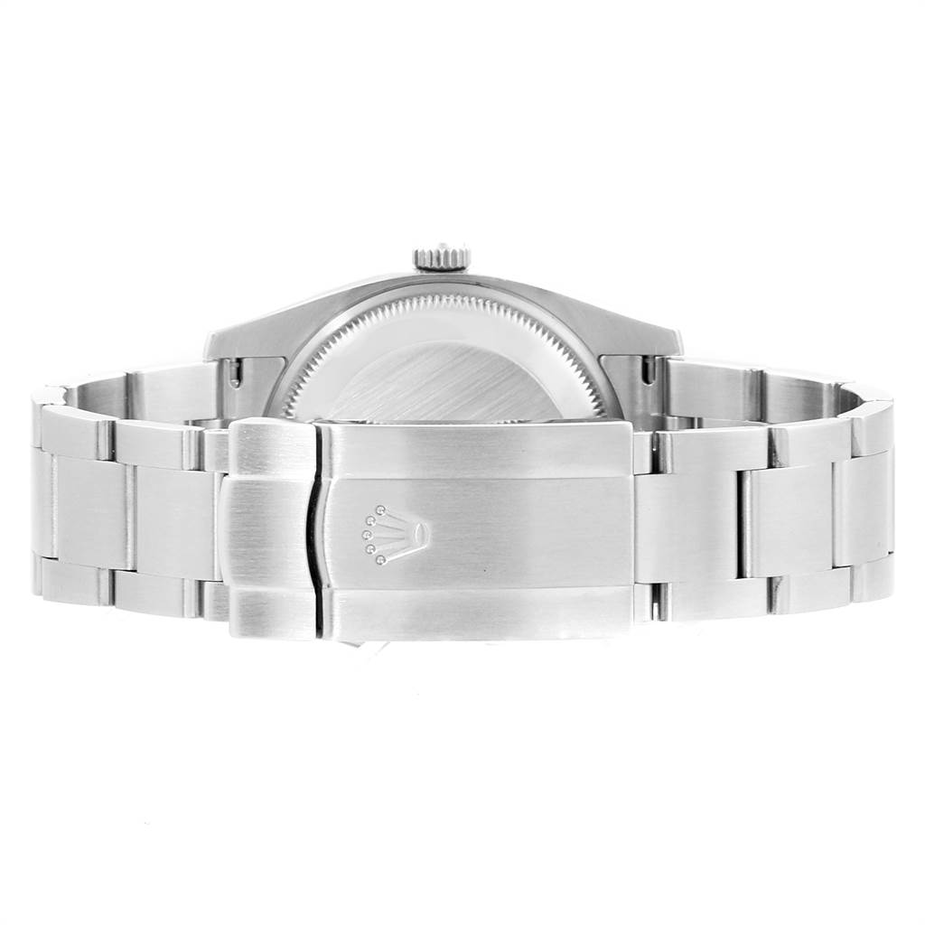 The image shows the Rolex Air-King 114200 Men's Stainless Steel Silver Dial 114200 Men's Stainless Steel Silver Dial watch from the back, focusing on the clasp and bracelet.