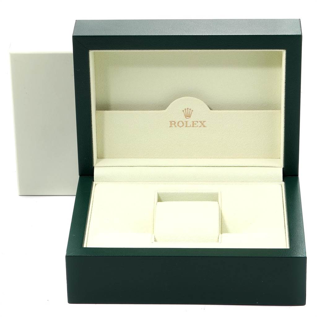 This image shows the open box for the Rolex Air-King 114200 Men's Stainless Steel Silver Dial 114200 Men's Stainless Steel Silver Dial watch, displaying a padded interior with the Rolex logo.