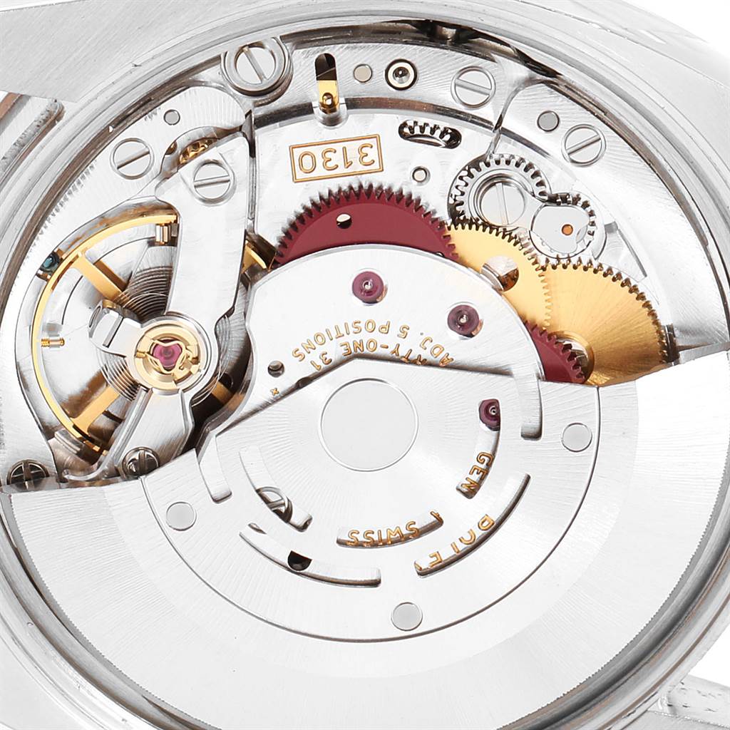 The image shows a detailed close-up of the movement mechanism in the Rolex Air-King 114200 Men's Stainless Steel Silver Dial 114200 Men's Stainless Steel Silver Dial watch.