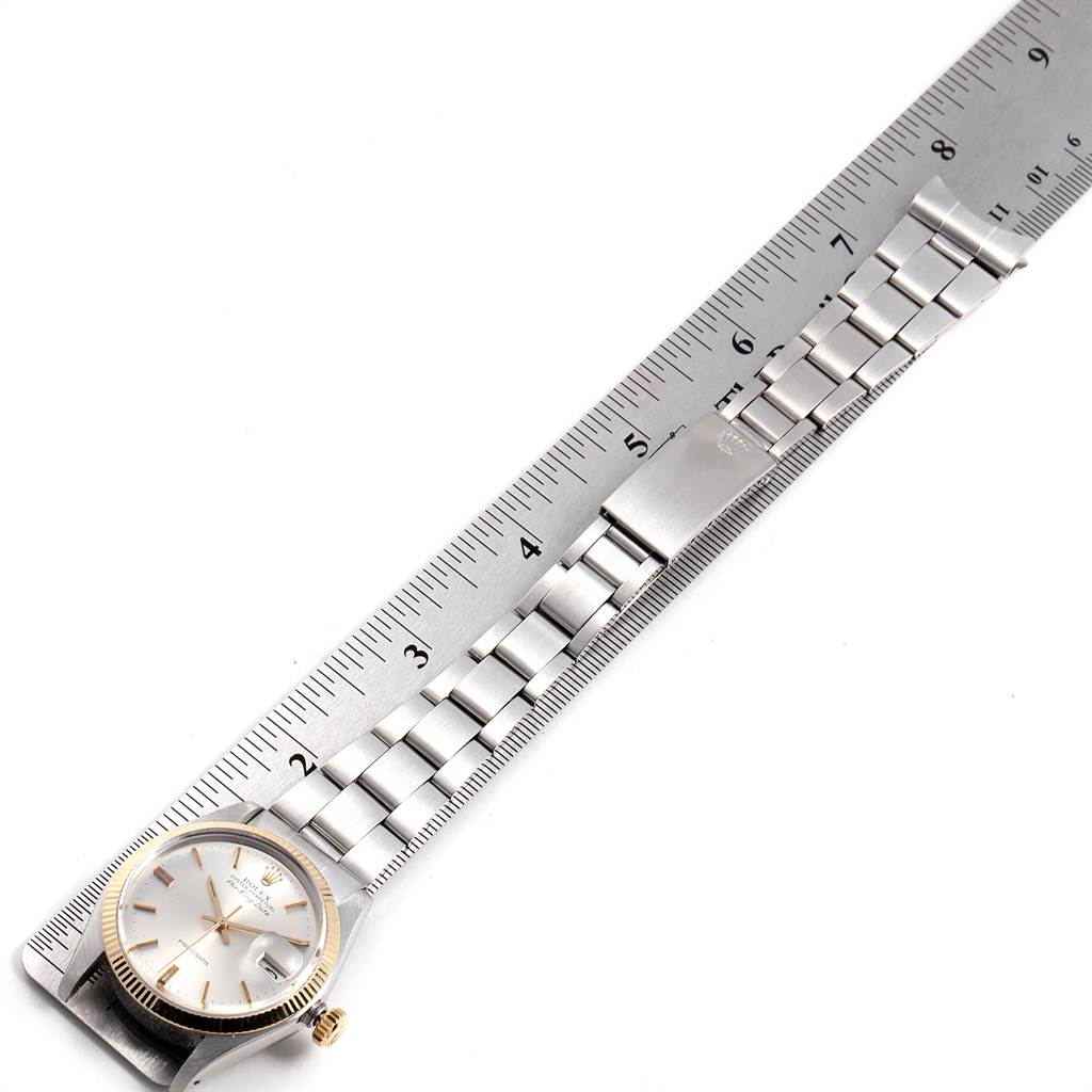 The image shows a Rolex Vintage Collection 5701 Men's Steel and Gold (two tone) Silver Dial 5701 Men's Steel and Gold (two tone) Silver Dial watch photographed flat with a ruler beside it for measurement reference.