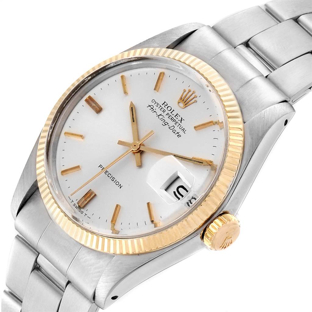 This image shows a close-up, angled view of the Rolex Vintage Collection 5701 Men's Steel and Gold (two tone) Silver Dial 5701 Men's Steel and Gold (two tone) Silver Dial watch, highlighting the face, bezel, crown, and part of the bracelet.