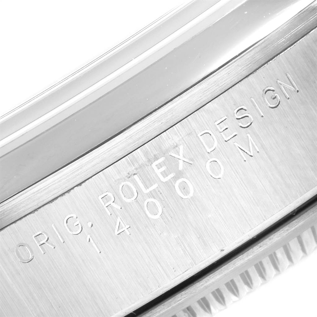 Close-up of the side engraving on the case of a Rolex Air-King 14000 Men's Stainless Steel Black Dial 14000 Men's Stainless Steel Black Dial watch, showing "ORIG. ROLEX DESIGN 14000M".