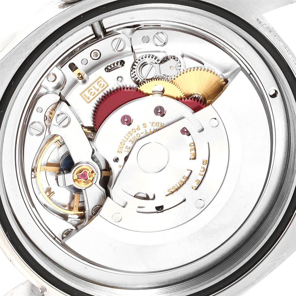 This image shows the inner mechanism and movement components of a Rolex Air-King 116900 Men's Stainless Steel Black Dial 116900 Men's Stainless Steel Black Dial watch from a close-up angle.