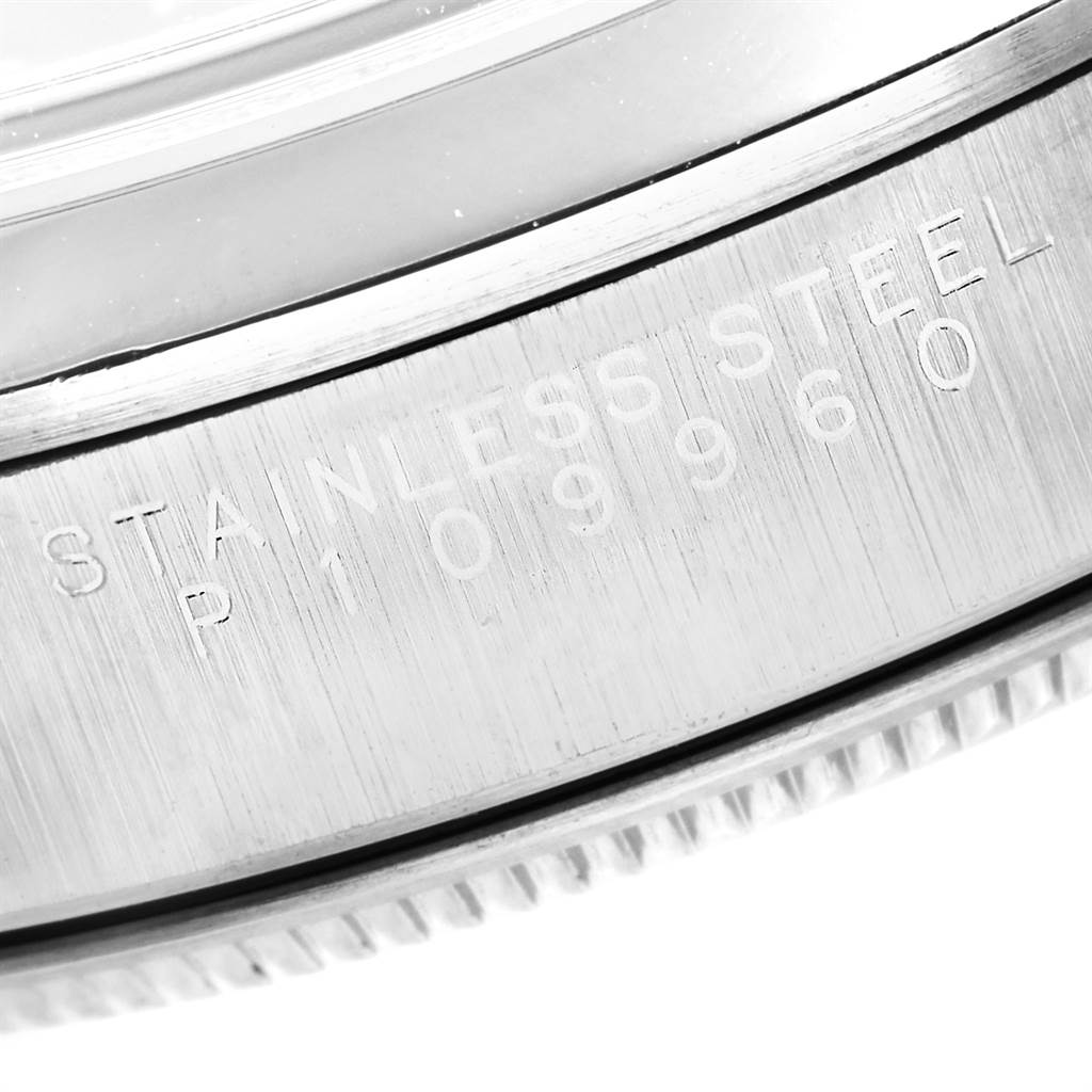 This close-up image shows the engraved stainless steel bezel of a Rolex Air-King 14000 Men's Stainless Steel Black Dial 14000 Men's Stainless Steel Black Dial watch.