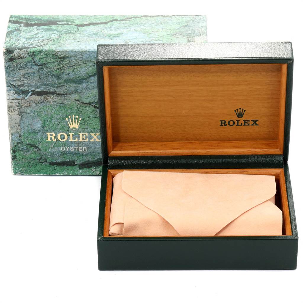 The image shows an open Rolex presentation box from the front, containing a wrapped Air-King model watch.