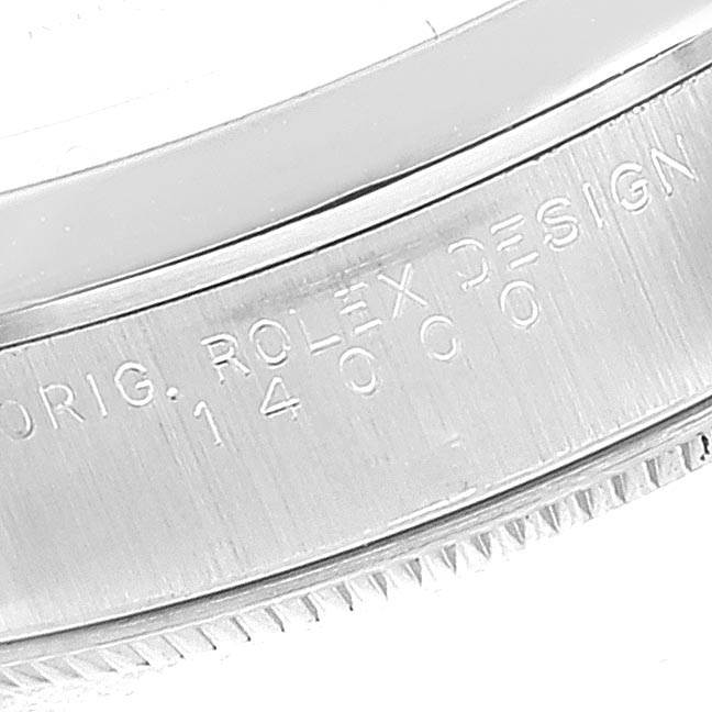 This image shows a close-up of the side engraving on a Rolex Air-King 14000 Men's Stainless Steel Silver Dial 14000 Men's Stainless Steel Silver Dial watch case.