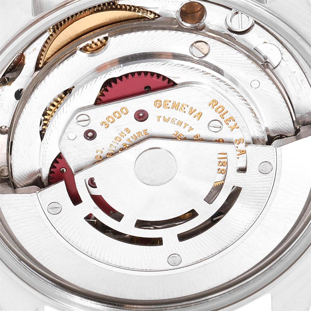 This image shows the internal mechanical movement of a Rolex Air-King 14000 Men's Stainless Steel Silver Dial 14000 Men's Stainless Steel Silver Dial watch, highlighting its intricate gears and components.